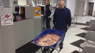 Man Pays Nearly 3000 Bill Using A Wheelbarrow Full Of Pennies [upl. by Shauna481]