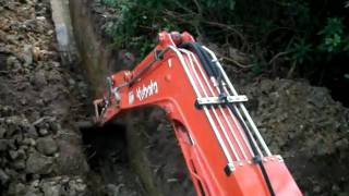 Mini excavator digging hard clay [upl. by Salangi]