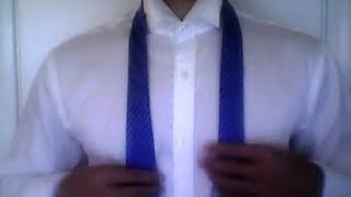 How to tie a tie  Quick and Easy [upl. by Nnateragram]