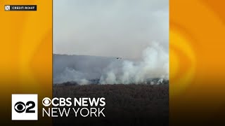 Crews battling wildfires across northern New Jersey [upl. by Honniball394]