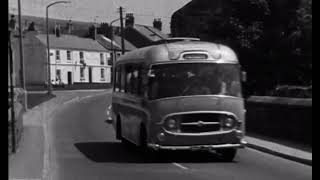 IVYBRIDGE DEVON A38 traffic grinds through the main high street 1960s [upl. by Heck]