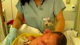 Newborn baby falls asleep during his first bath [upl. by Norbie]