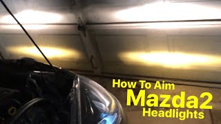 How To Aim The Headlights On Your Mazda2 [upl. by Adnalohs]