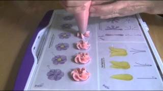 Cake Decorating Piping Techniques How to Make Drop Flowers [upl. by Eseilanna]