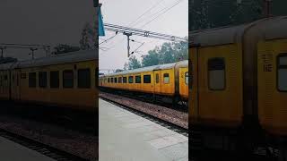 Agartala Tejes Rajdhani express with wap7 locomotive cross A local station youtube viralvideo [upl. by Curzon]