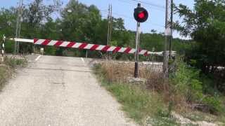 Passaggio a livello di via Sila in HD  Fosso Ghiaia RA  Level Crossing [upl. by Wilinski193]