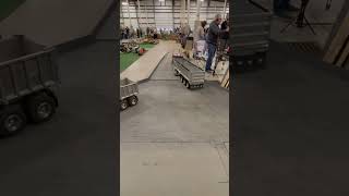 Custom built RC tow truck towing a tractor trailer truck at Cabin Fever Expo [upl. by Felise722]