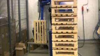 Motoman robot nailing timber pallets [upl. by Oinimreh]