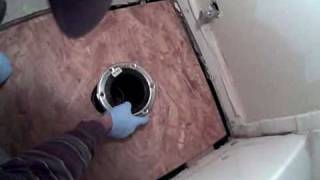 Bathroom subfloor repair toilet flange fitting and installation [upl. by Ailedamla515]