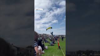 US navy parachutist lands on spectators during air show [upl. by Yddur]