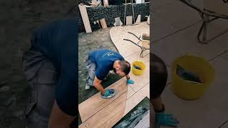 Cutting a curve in porcelain to transition from a 900x600 tile to 1200x300 prank porcelain fly [upl. by Abita]