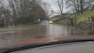 Driving though flood water at Wath near Pateley Bridge in February 2022 [upl. by Leavitt346]