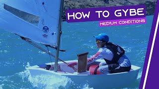 OPTIMIST SAILING  How To Gybe  Medium Conditions [upl. by Noscire330]