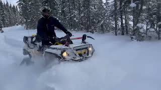 Atvs in deep snow  Kingquad pulling the canam [upl. by Arrat267]