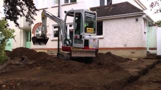 Takeuchi TB016 Grading A Driveway [upl. by Hsetirp]