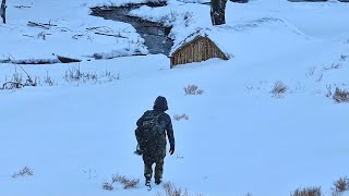 SURVIVING a SNOWSTORM Overnight in a Bushcraft Shelter [upl. by Arodnap711]