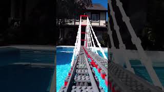 Lego train ride on a huge Lego cablestayed bridge over the pool209lego legocity legocolle [upl. by Demmy]