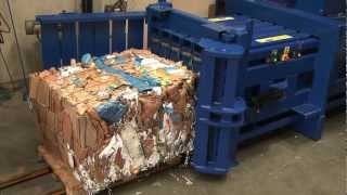 HZ 70T Horizontal baler making a bale from cardboard boxes [upl. by Assenahs]