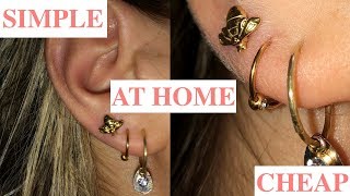 How To Pierce Your Ears At Home  Like A Pro [upl. by Aifos]