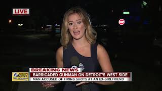 Barricaded gunman Man accused of firing shots at exgirlfriend in Detroit [upl. by Ellevart]