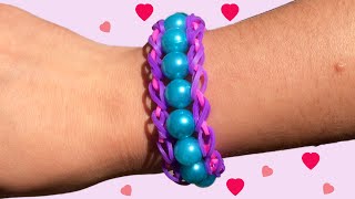 Loom armbandjes maken met kralen op een vork [upl. by Silvain]