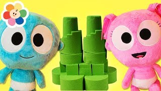 Kinetic Sand amp Surprise Toys with The Baby Shark Song  GooGoo amp Gaga Pretend Play Toys  BabyFirst [upl. by Ardnikal660]