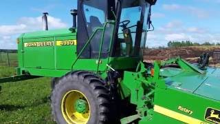 John Deere 4990 windrower [upl. by Ahseia]