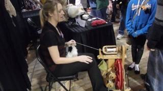 Making wool clothing from rabbit fur with a spinning wheel at the Calgary Pet Expo 2017 [upl. by Tam]