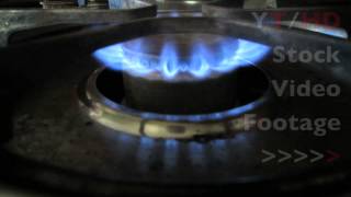 Cooktop Gas Stove Range Burner Flame Ignitor Turning On amp Off w Blue Fire  HD Stock Video Footage [upl. by Yeleen]