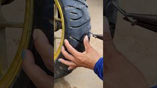 Plugging a motorcycle tire viral flattire diy fattire shortvideo art flat shorts [upl. by Atirac324]