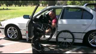 Paraplegic transfers in and out of fourdoor BMW with TiLite ZR [upl. by Eittam325]