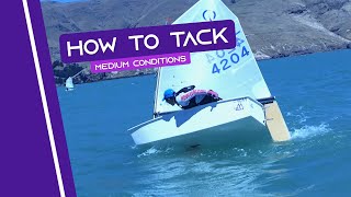 OPTIMIST SAILING  How To Tack  Medium Conditions [upl. by Nareht]