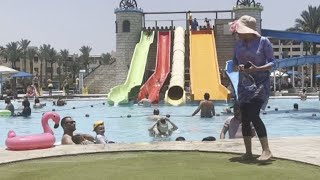 Family holiday Grandad steps in to help granddaughter slide with joy  WooGlobe [upl. by Enitsenrae]