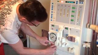 Home haemodialysis lining the machine [upl. by Esoj]