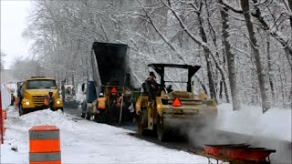 STREET PAVING IN THE SNOW IN MONTREAL QC [upl. by Bala]