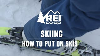 How to Put on Skis  REI [upl. by Edholm164]