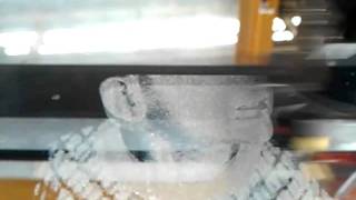 Laser engraving of a photo on glass a glass mirror [upl. by Ramal654]