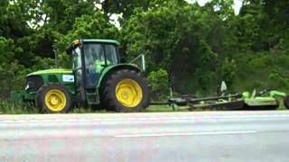 MoDOT Crews Mowing Along I44 Lawrence County 2mp4 [upl. by Kerrie411]