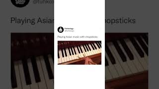 Playing piano with chopsticks 🧧🎶 piano pianomusic pianomusic chopsticks asian music musica [upl. by Llehsal929]