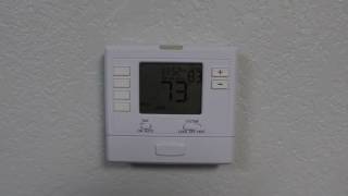 Program Your T705 Programmable Thermostat [upl. by Eilitan55]