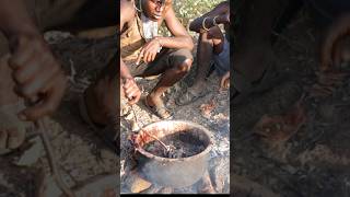 Hadzabe men cooking offals for dinner shortfeed hadzabetribe africa [upl. by Lorne]