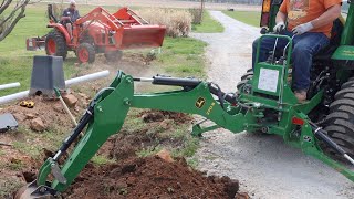 Digging septic lines with a Kubota L2501 and a John Deere 2038R [upl. by Ecnerrot]