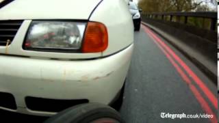 Cyclist captures road rage with helmet cam [upl. by Ltihcox]