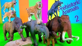 NEW Prehistoric Animals MAMMOTH SMILODON  fun video for kids [upl. by Aelem]