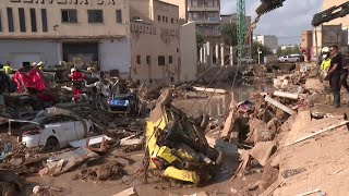 Spain rescuers search for missing people in cars wrecked by flooding  AFP [upl. by Mccurdy868]