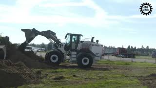 Hidromek HMK635 wheel loader and 310 LC excavator [upl. by Giff724]