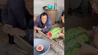 The process of cutting watermelon with steel knife [upl. by Aseiram103]