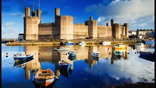 Caernarfon Castle Wales Drone Video [upl. by Aimerej]