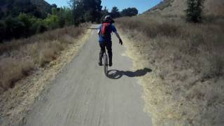 quotUnicycle Tutorialquot Kris HolmSchlumpf Geared Unicycle Hub and High Speed Unicycling Muni Downhill [upl. by Einafit211]