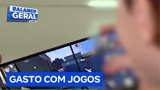 Menino de 8 anos gasta R 40 mil no cartão de crédito do pai com jogos virtuais [upl. by Neehsas368]